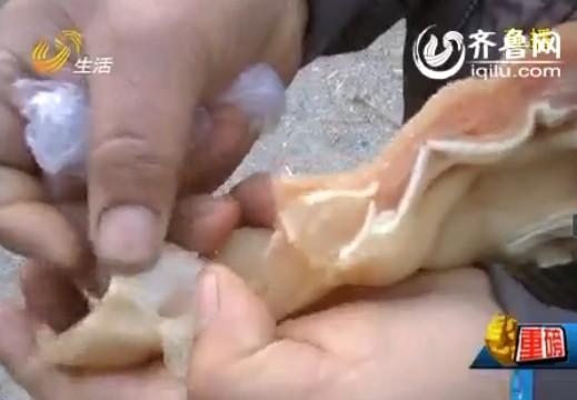 潍坊男子疑买到假猪耳朵 含胶状物吃起来香(图)