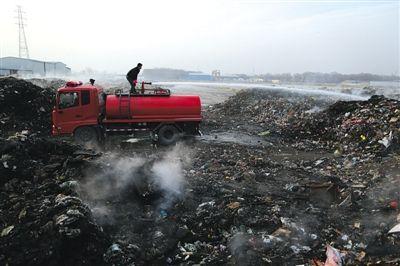 持续清运 北京自燃“垃圾山”已搬走大半