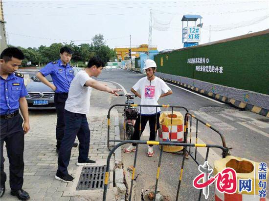 句容城管巡查发现路面塌陷 及时协调处理保通行安全