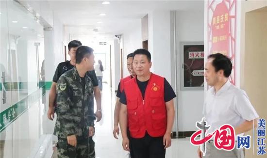 军民雨水情，共建志愿行——武警射阳中队领导来射阳助残会开展志愿服务观摩交流会