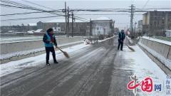 兴化市合陈镇：扫雪除冰保出行 网格服务显真情