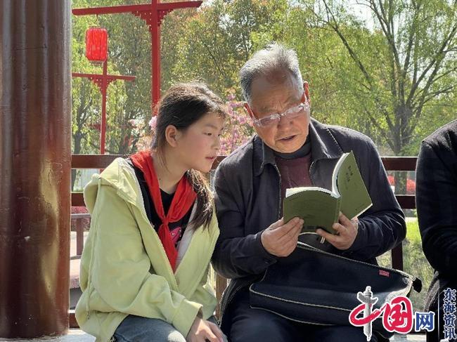 兴化市钓鱼镇开展“老少共读 相约樱花园”读书分享主题活动